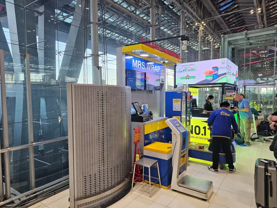 Serviciu de împachetare a bagajelor